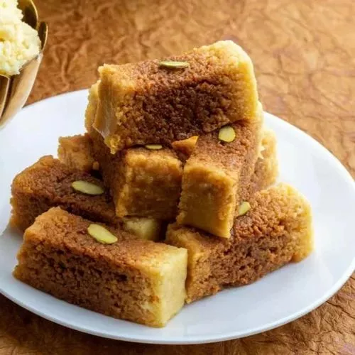 Traditional Rajasthani Kalakand sweet made from milk topped with pistachios and saffron