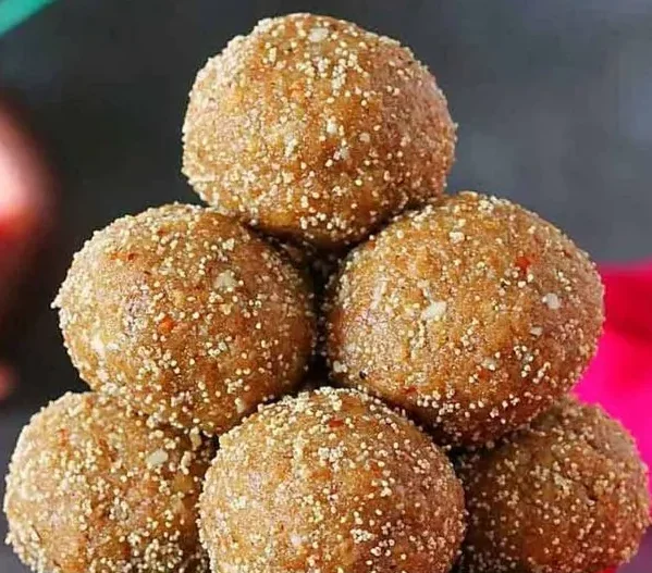 Stack of Indian Churma Ladoos in a bowl.